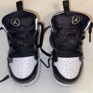Size 5c infant hard bottom Jordan 1s black/white